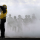 Illustration for article titled Here Is What All Those Colored Shirts Mean On An Aircraft Carrier's Deck